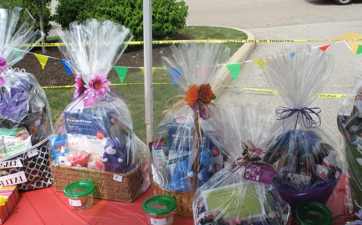 Gift baskets lined up for the raffle at a Bartels Busack open house